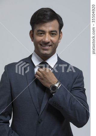 Portrait of confident businessman in suit Portrait of confident businessman in suit 35504920