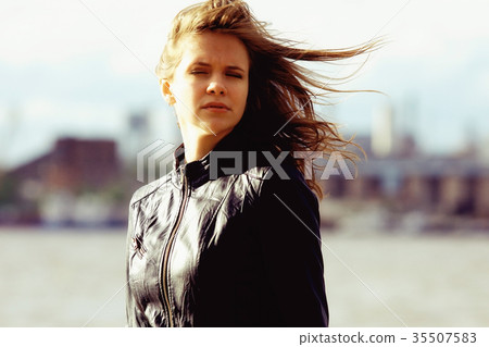 Spring portrait of young beautiful brunette 35507583