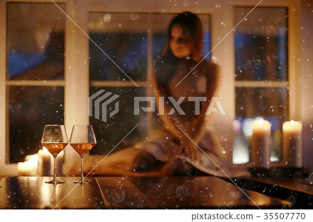 Girl adult evening candles romance holiday christmas home portrait Girl adult evening candles romance holiday christmas home portrait 35507770