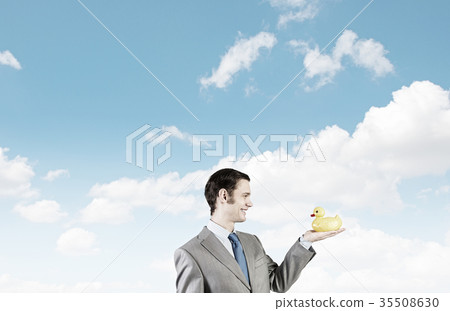 Businessman with duck 35508630