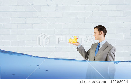 Businessman with duck 35508634