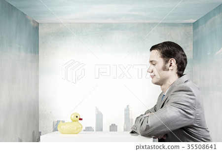 Businessman with duck Businessman with duck 35508641