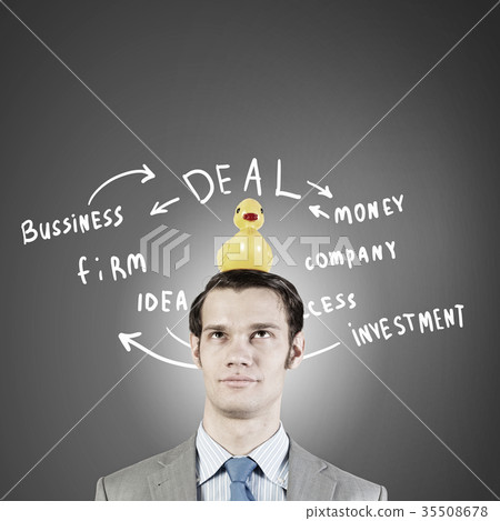 Businessman with duck Businessman with duck 35508678