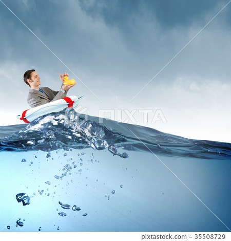 Businessman with duck 35508729