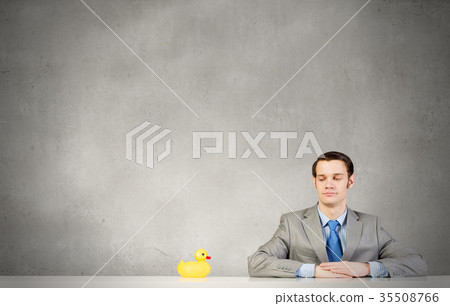 Businessman with duck 35508766