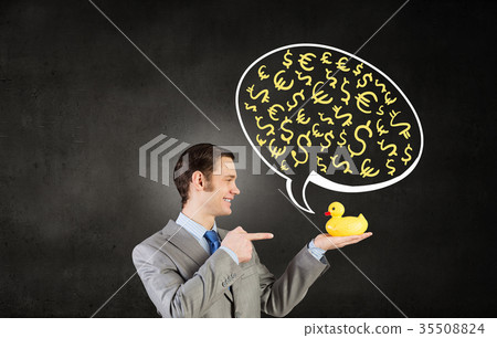 Businessman with duck 35508824