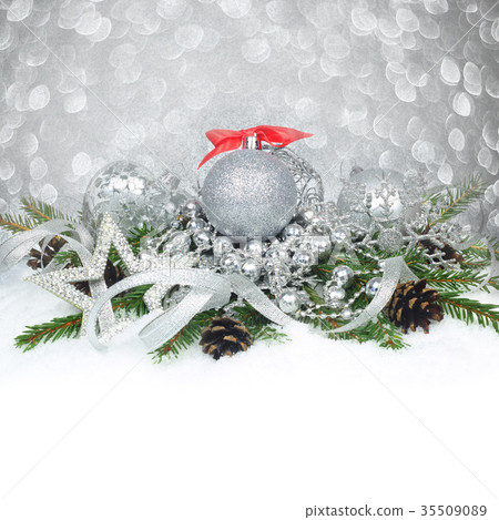 Christmas baubles on snow 35509089