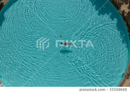 Asian woman swimming in the pool Asian woman swimming in the pool 35509688