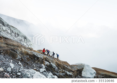 Group of young travelers walking on Kawah Ijen 35510646