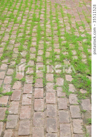 Stone block with grass pavement 35511528