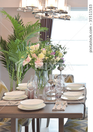 dining set on wood table with beautiful chandelier dining set on wood table with beautiful chandelier 35511583