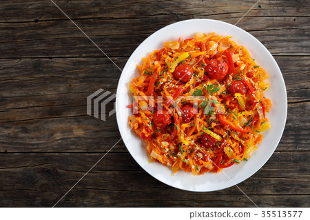pumpkin salad with tomatoes on plate 35513577