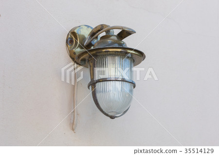Vintage looking metal lantern with modern lamp 35514129