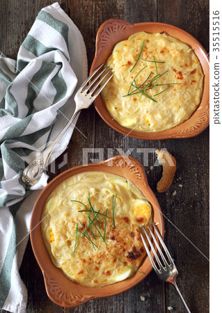 French cuisine. Gratin with eggs, onion and cheese French cuisine. Gratin with eggs, onion and cheese 35515516