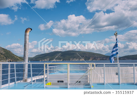 The Greek flag on the ship against the islands The Greek flag on the ship against the islands 35515937