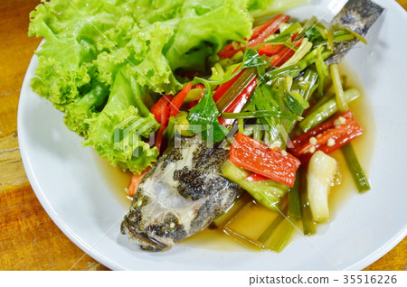 steamed sand goby fish with soy sauce on dish steamed sand goby fish with soy sauce on dish 35516226
