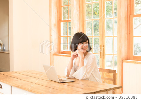 Young woman working with laptop 35516383