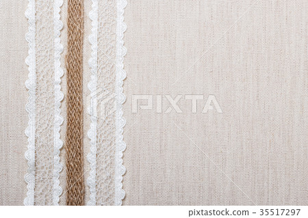 Lace frame on linen cloth background 35517297