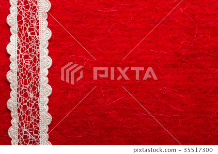 Vintage white lace over red background 35517300