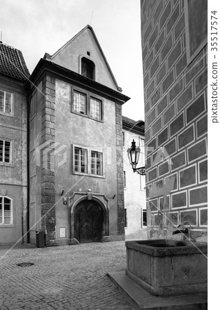 Old houses and small fountain at Golden street of 35517574