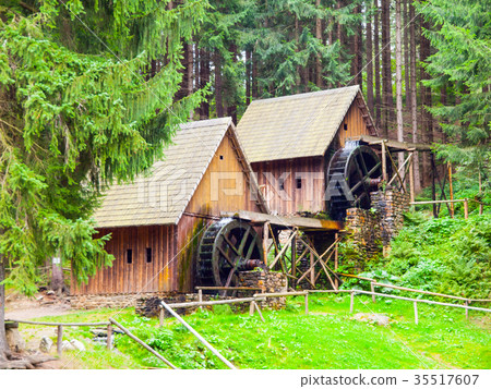 Gold ore mills. Medieval wooden water mills in 35517607