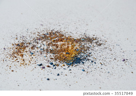 color powder spread on white paper 35517849