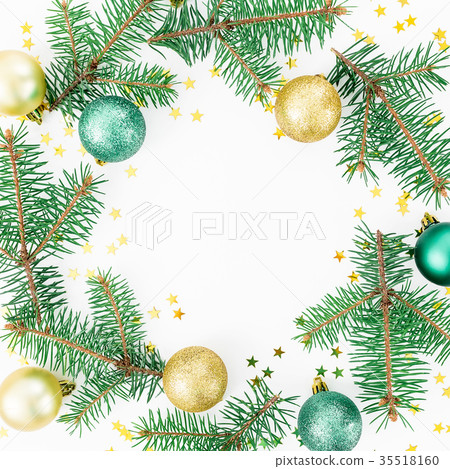 frame of winter trees, balls and golden confetti 35518160