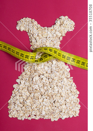 dress shape made from oatmeal with measuring tape 35518708