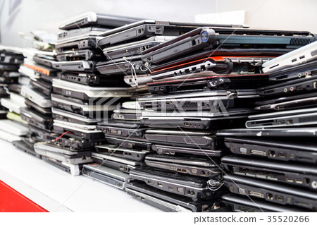Stack of old, broken and obsolete laptop computer  35520266