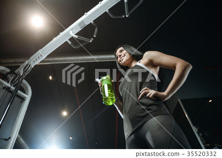 Sexy athletic young girl working out in gym 35520332