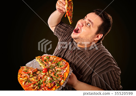 Fat man eating fast food slice pizza . Breakfast Fat man eating fast food slice pizza . Breakfast 35520599