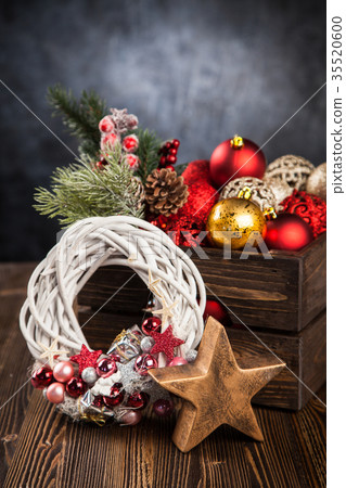 Christmas ornaments in a wooden crate Christmas ornaments in a wooden crate 35520600