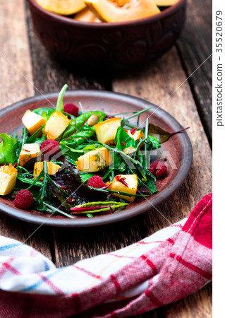 Warm pumpkin salad with raspberries Warm pumpkin salad with raspberries 35520679
