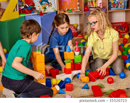 Children building blocks in kindergarten. Group 35520723