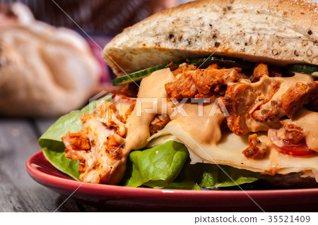 Fried chicken meat with cheese and vegetables Fried chicken meat with cheese and vegetables 35521409