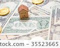 House model and golds on group of cash 35523665