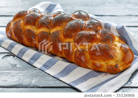 Homemade bread challah with poppy seeds. 35526906