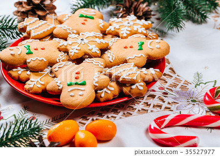 Christmas gingerbread cookies homemade on red 35527977