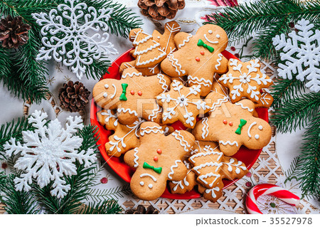 Christmas gingerbread cookies homemade on red 35527978
