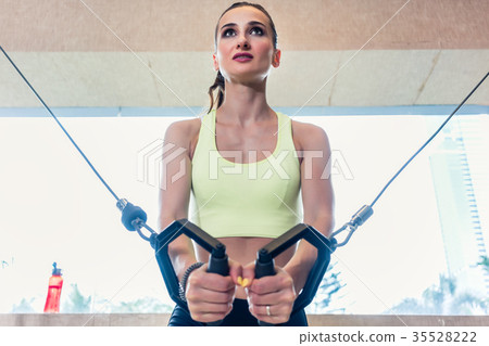 Low-angle view portrait of a cheerful beautiful 35528222