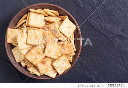 Homemade crackers in bowl 35528521