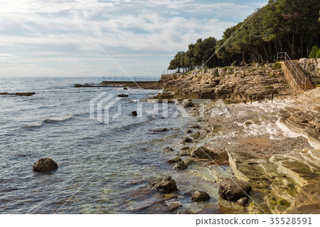 Sunset rocky beach in Istria, Croatia. 35528591