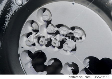 Dental milling machine carving out shape of human Dental milling machine carving out shape of human 35529368