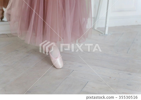 Ballerina puts pointe shoes Ballerina puts pointe shoes 35530516