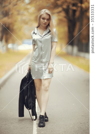 Young girl in autumn portrait, blond adult Young girl in autumn portrait, blond adult 35533331