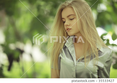 Summer beautiful young blonde in the park Summer beautiful young blonde in the park 35533427
