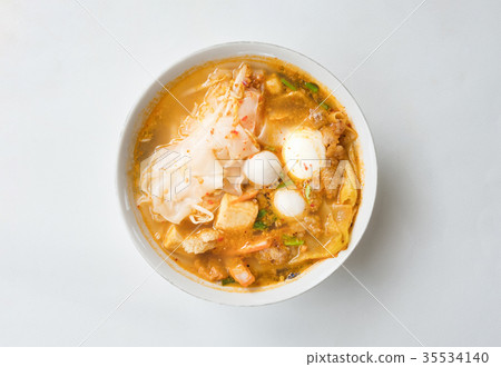 Top view spicy TOM YAM pork isolated clipping path 35534140