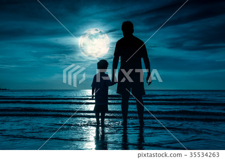 Father's day. Silhouette of child kiss her father. Father's day. Silhouette of child kiss her father. 35534263