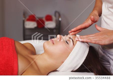 Spa treatment. Face massage 35534488