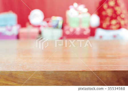 Wooden board with gift boxes. 35534568